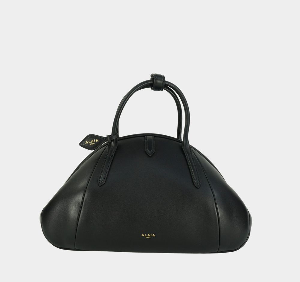 ALAÏA Purse Top handle bag in calfskin